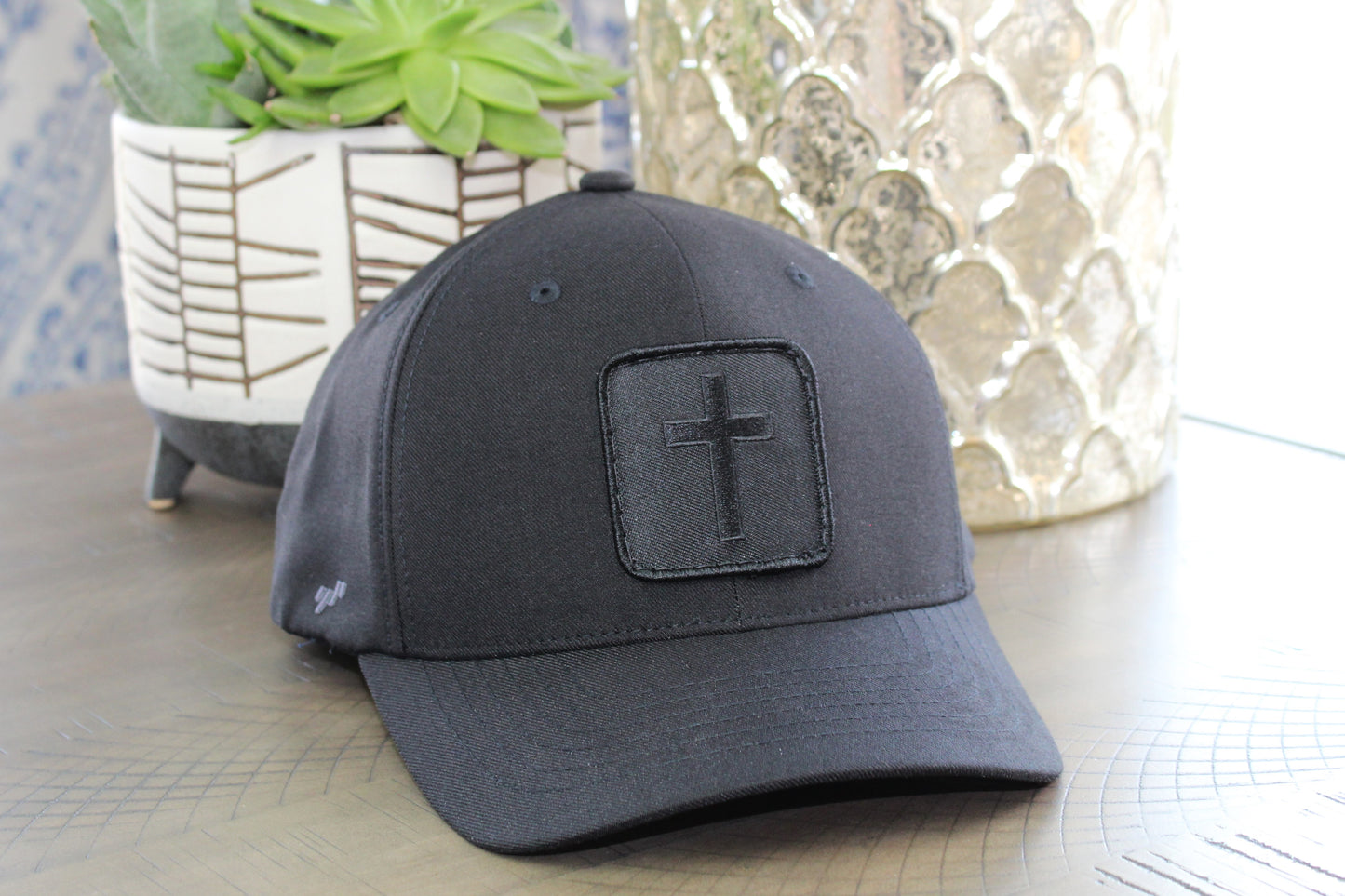 Black FlexFit Hat with a Blackout Cross Patch