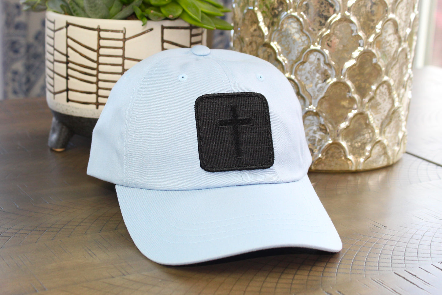 Light blue adjustable hat with Blackout Cross Patch