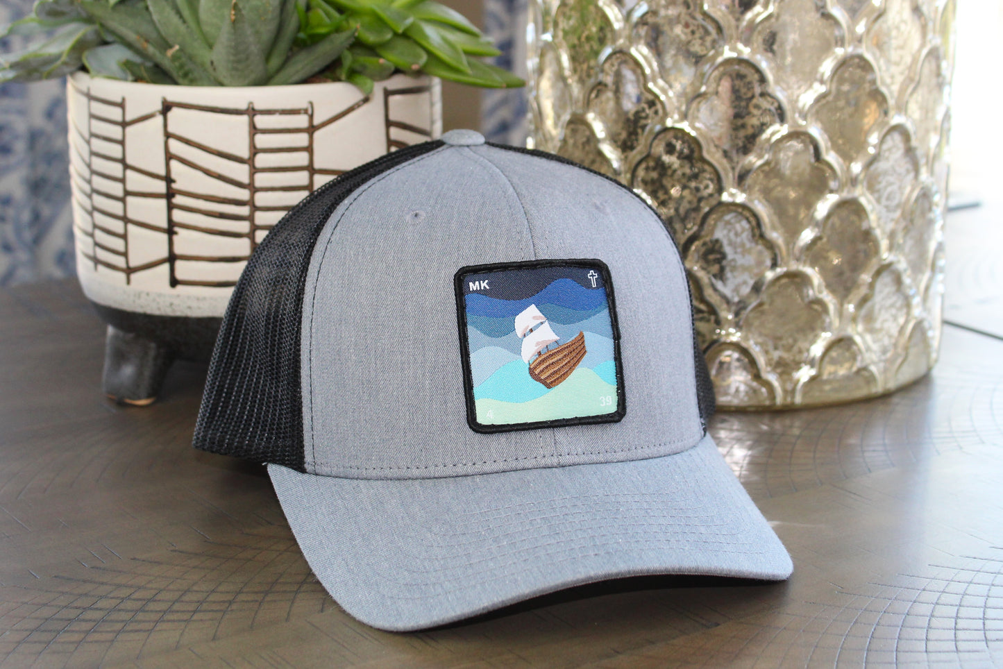 Heather gray/Black snapback with a Jesus calms the storm patch
