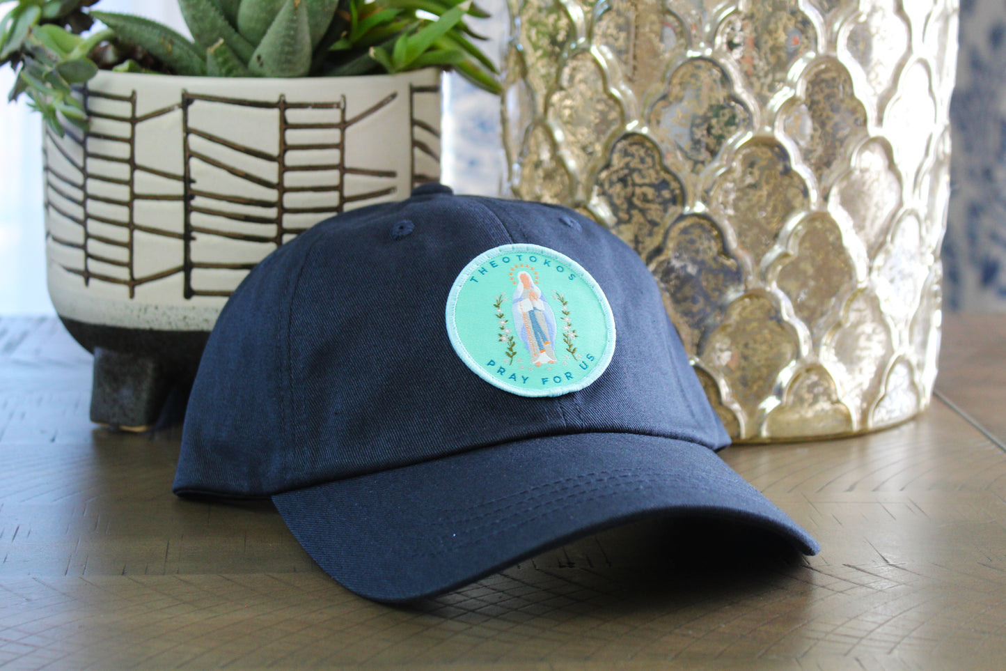 Navy adjustable hat with a theotokos patch