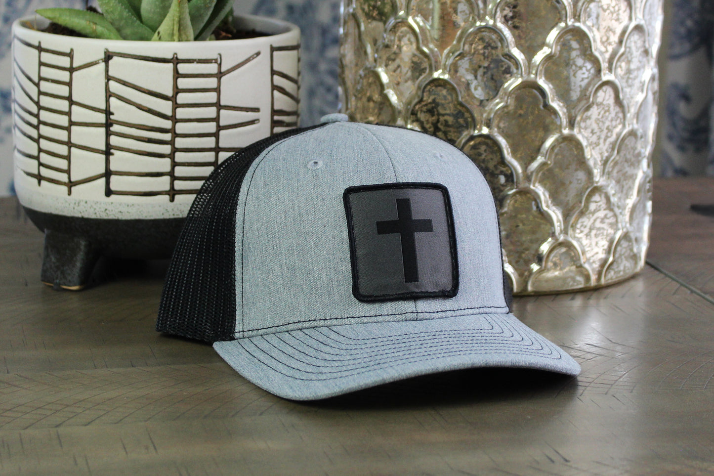 Heather gray/black youth snapback with a humble threads cross