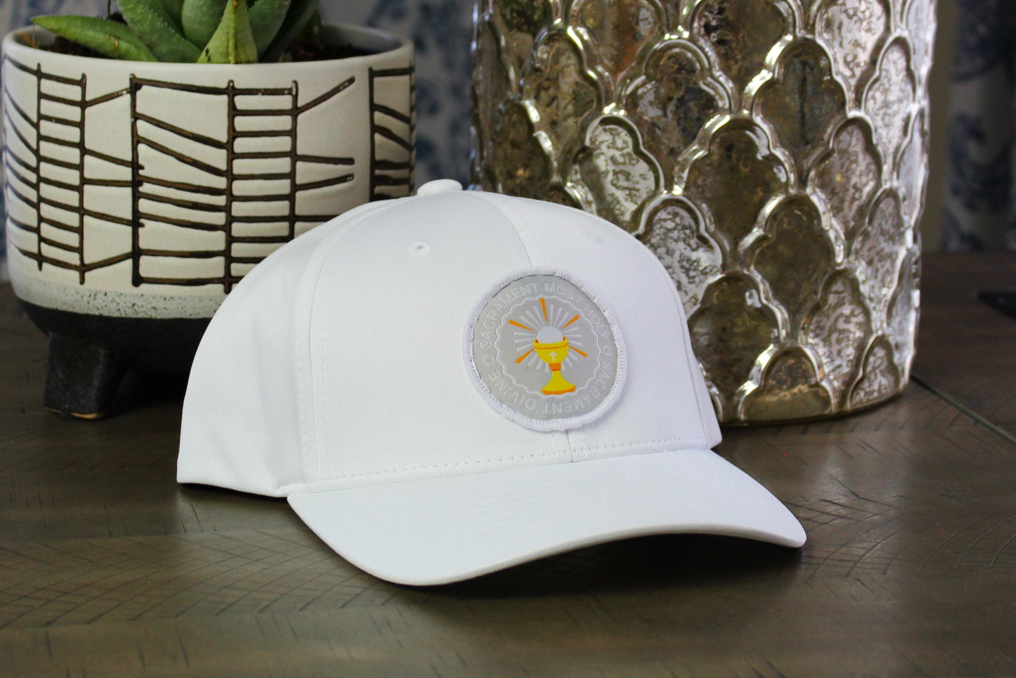 white youth snapback with an o sacrament patch