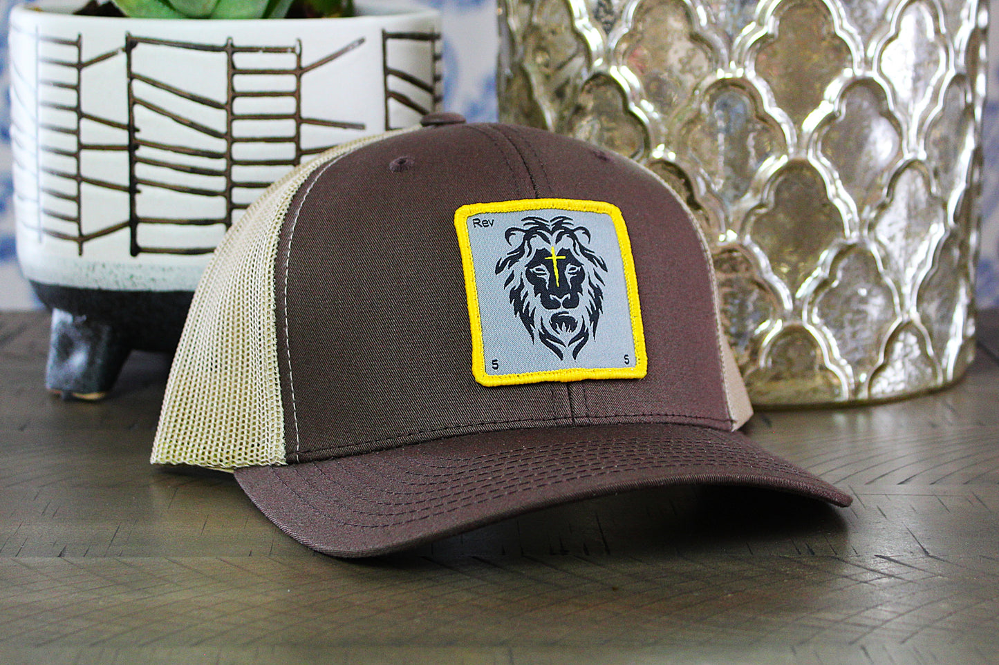 Brown/Khaki Snapback with a lion patch