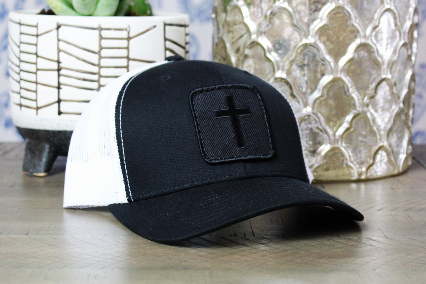 Black/white Snapback Hat with a Blackout Cross Patch