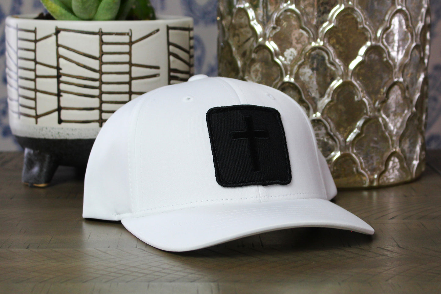 White youth snapback hat with Blackout Cross Patch