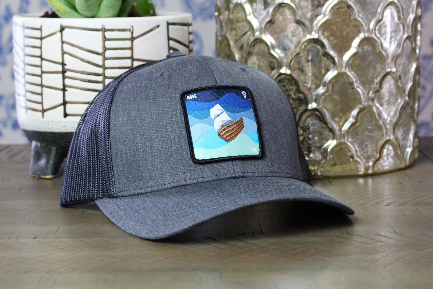 Dark Heather Gray/Black snapback with a Jesus calms the storm patch