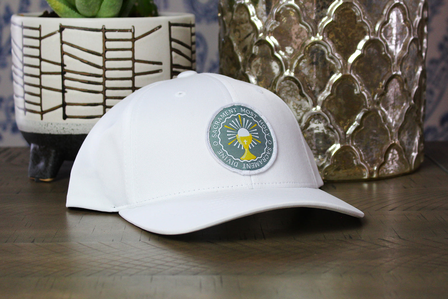 White youth snapback with an o sacrament patch