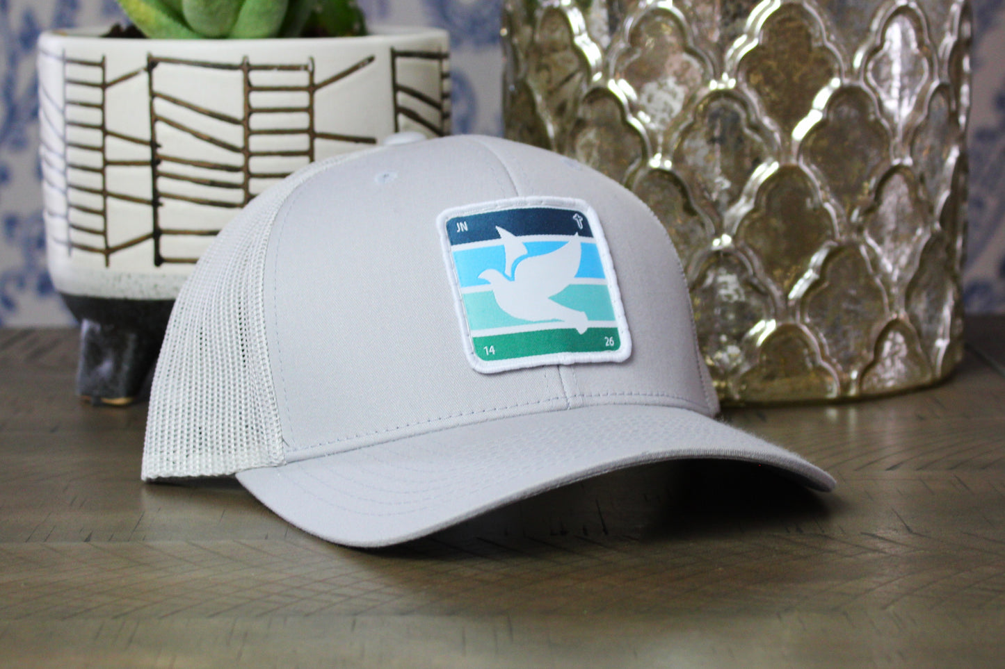 silver snapback with holy spirit dove patch