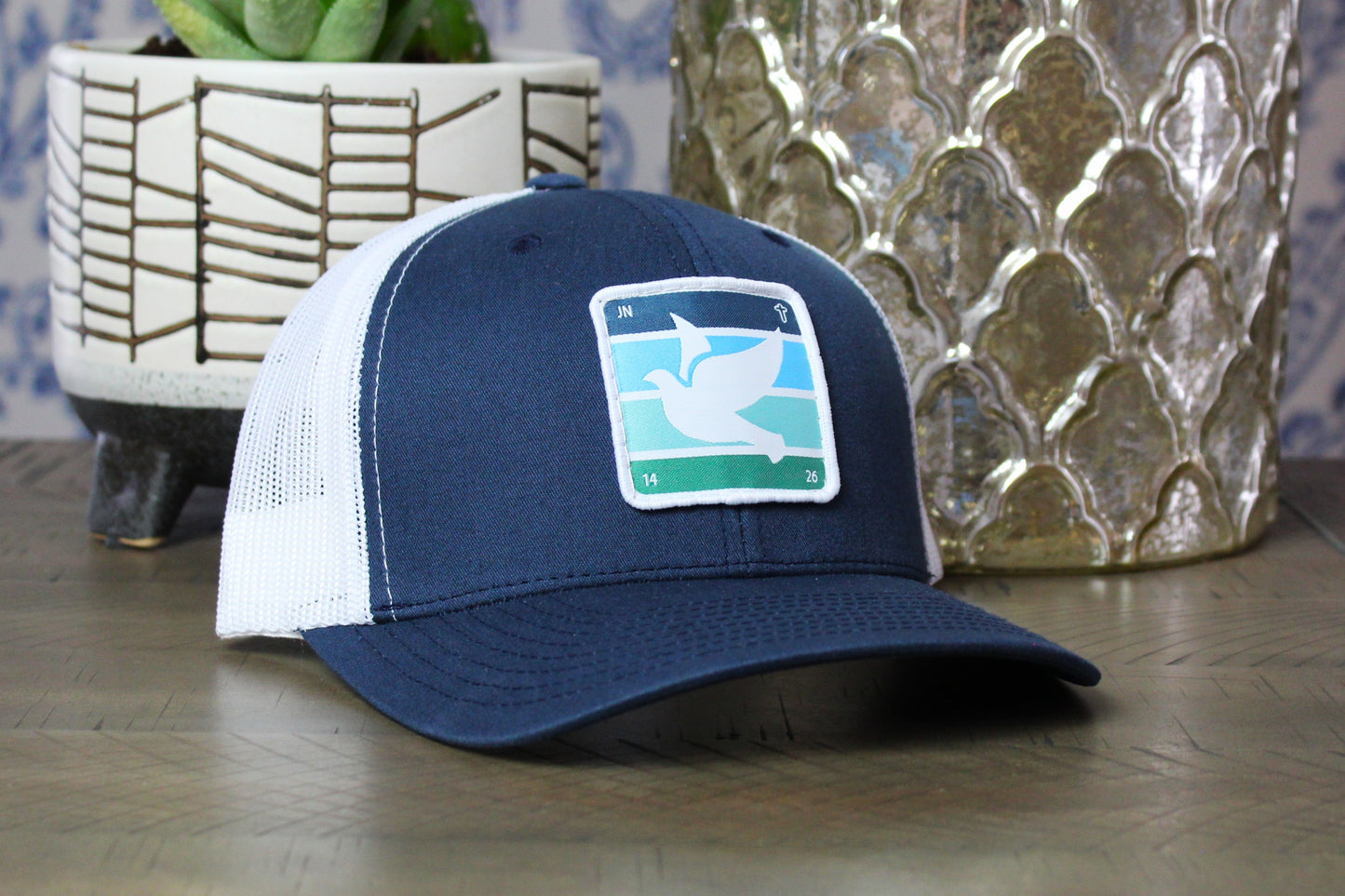 Navy/white snapback with holy spirit dove patch