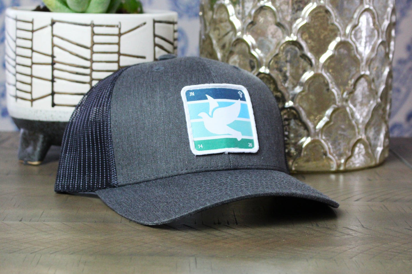 Dark Heather gray/black snapback with holy spirit dove patch