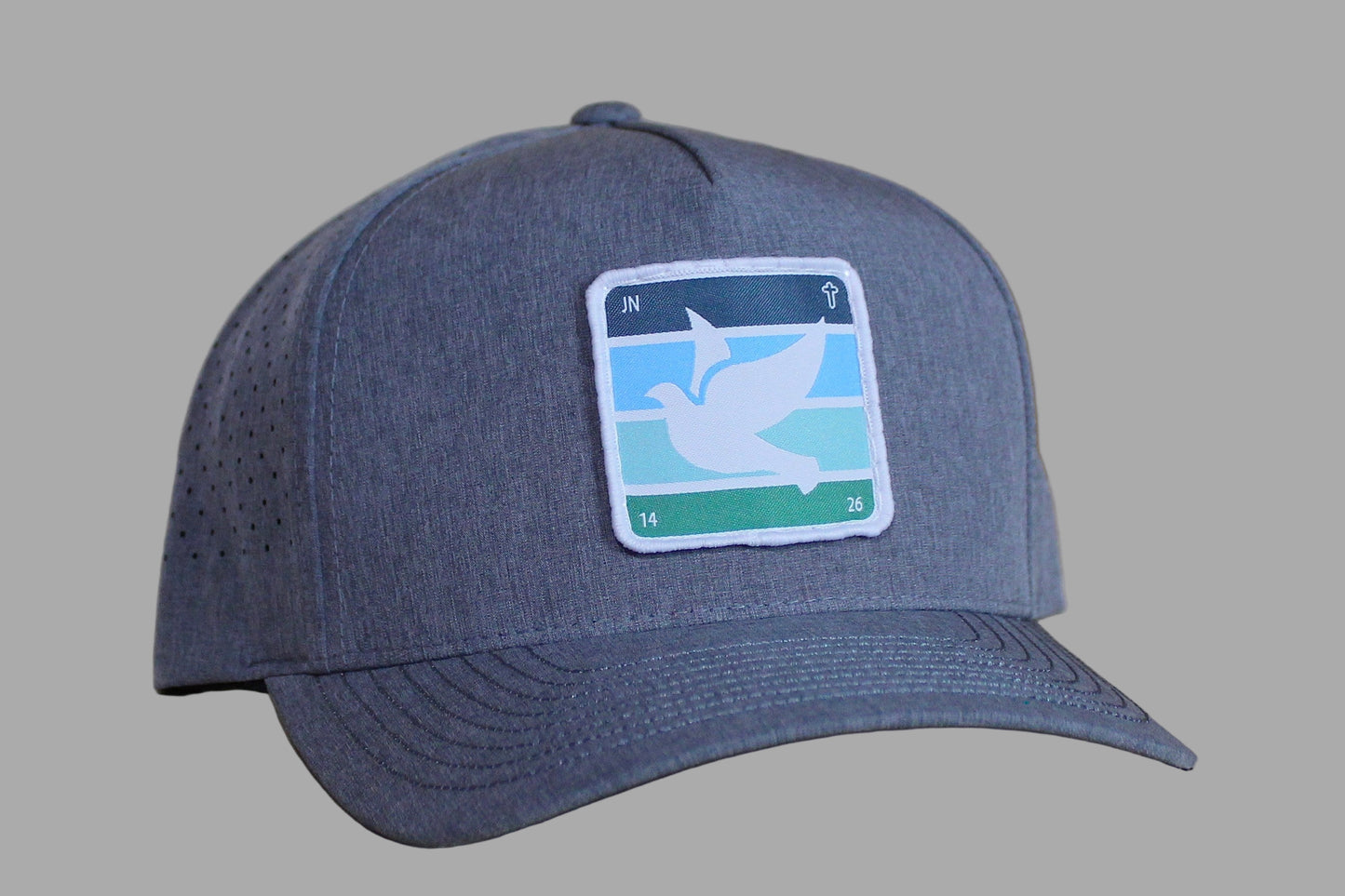 Gray cap with a logo on a wooden surface