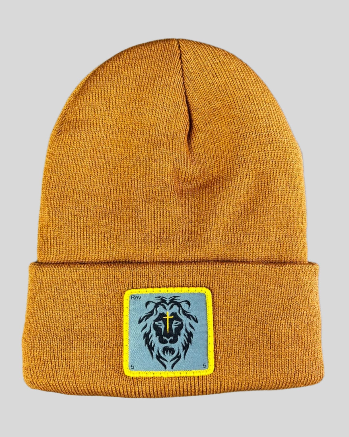 Carmel Brown winter hat with a lion patch