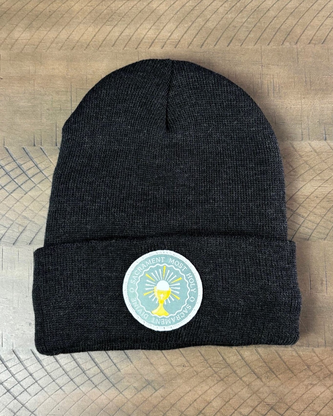 Heather charcoal winter hat with an O Sacrament Patch