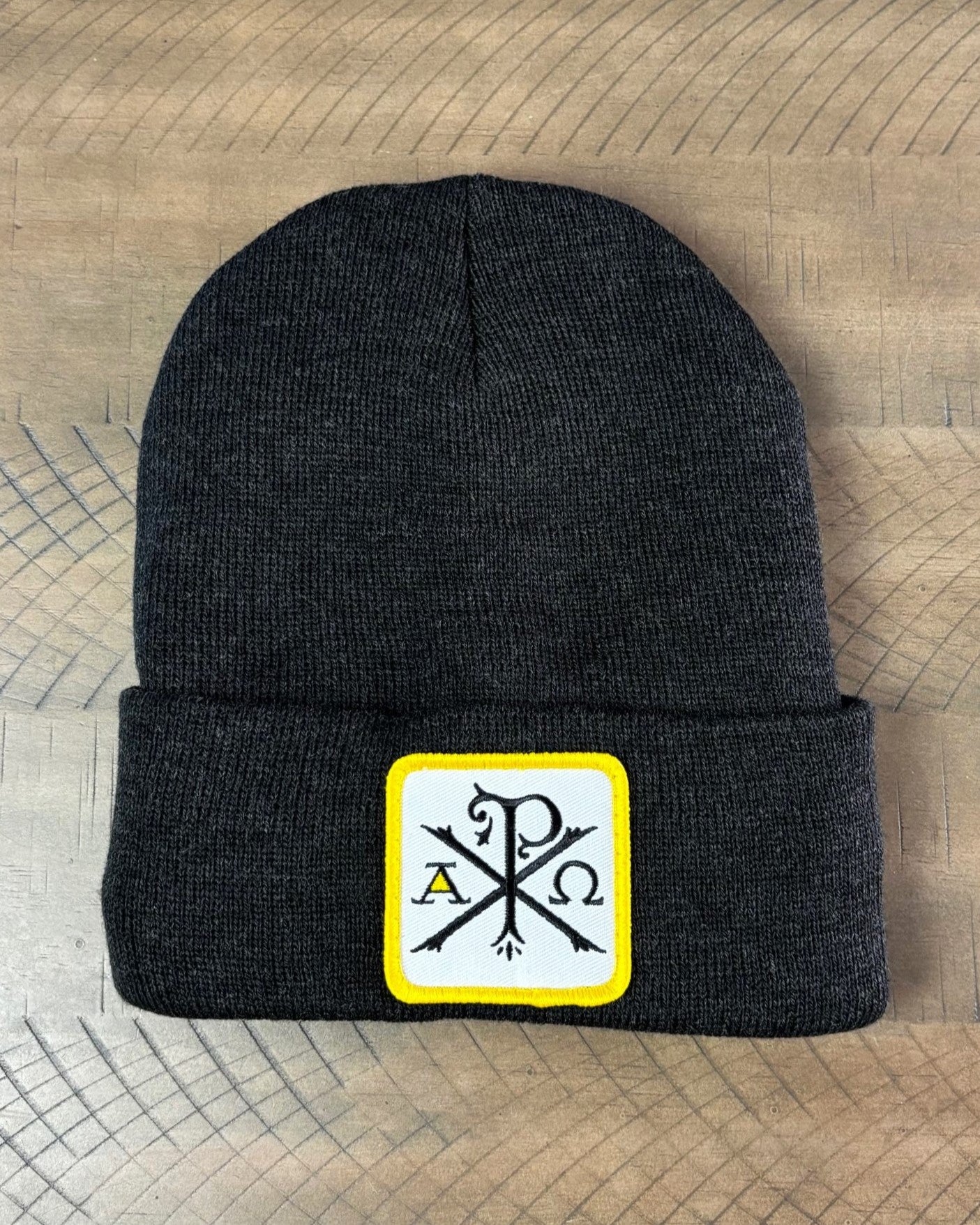 Heather Charcoal winter hat with a chi-rho patch