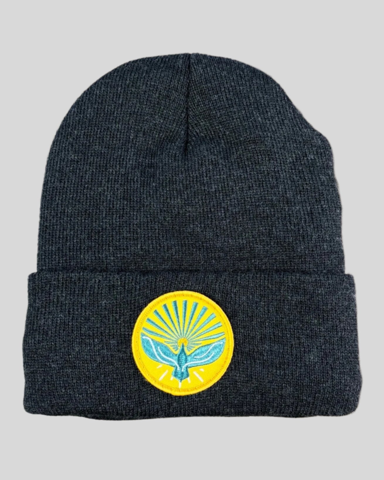 Heather charcoal winter hat with a pentecost patch