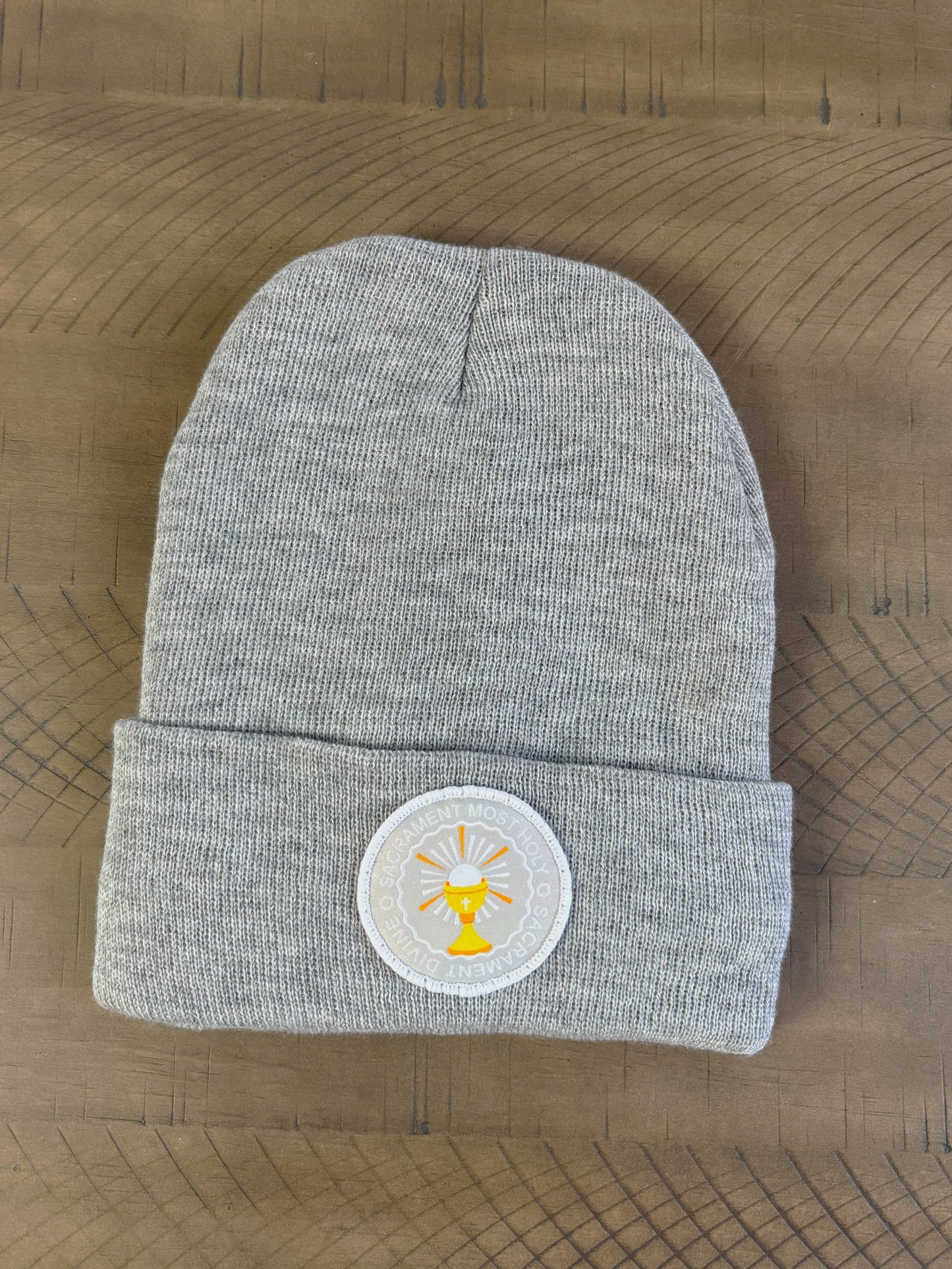 Heather gray winter hat with an o sacrament patch