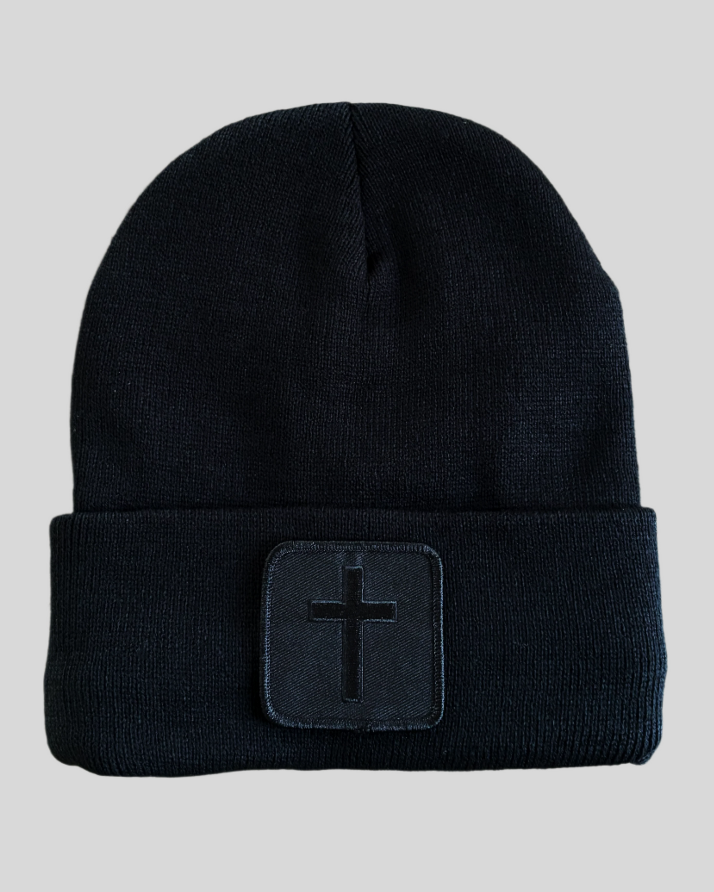 Black winter hat with a Blackout Cross Patch