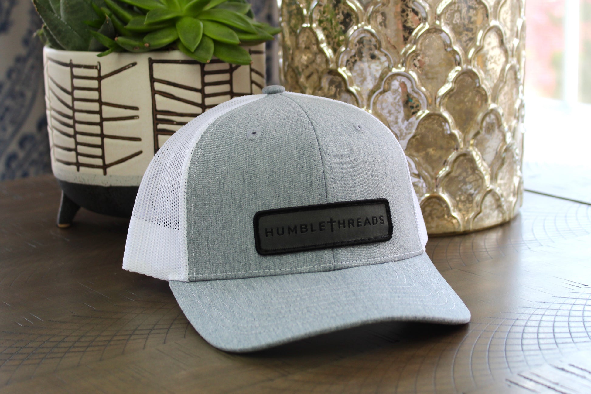 Heather gray/white youth snapback hat with humble threads patch