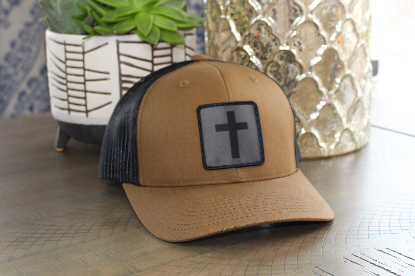 Coyote Brown/Black snapback with a humble threads cross patch