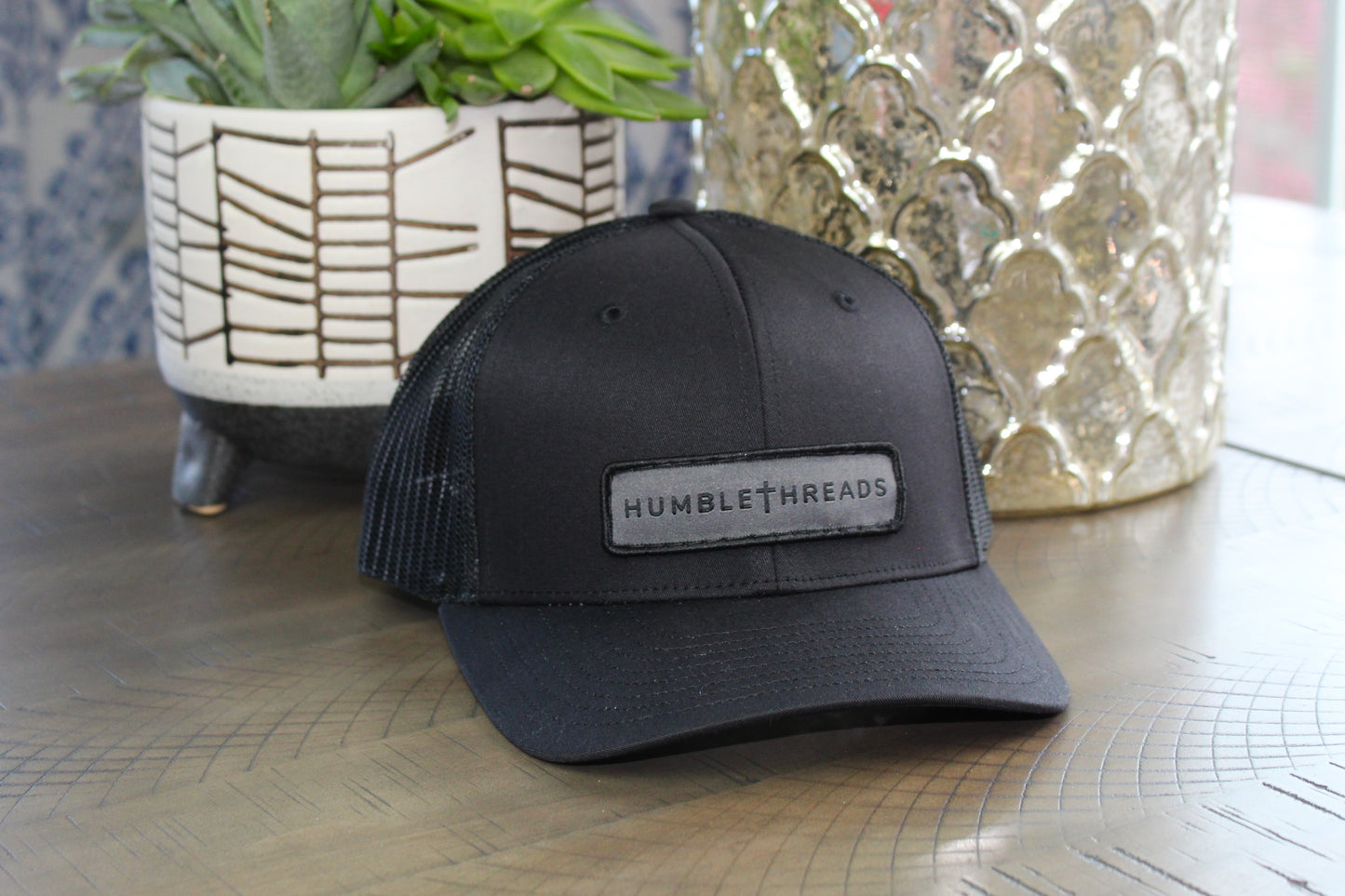 Black youth snapback hat with humble threads patch