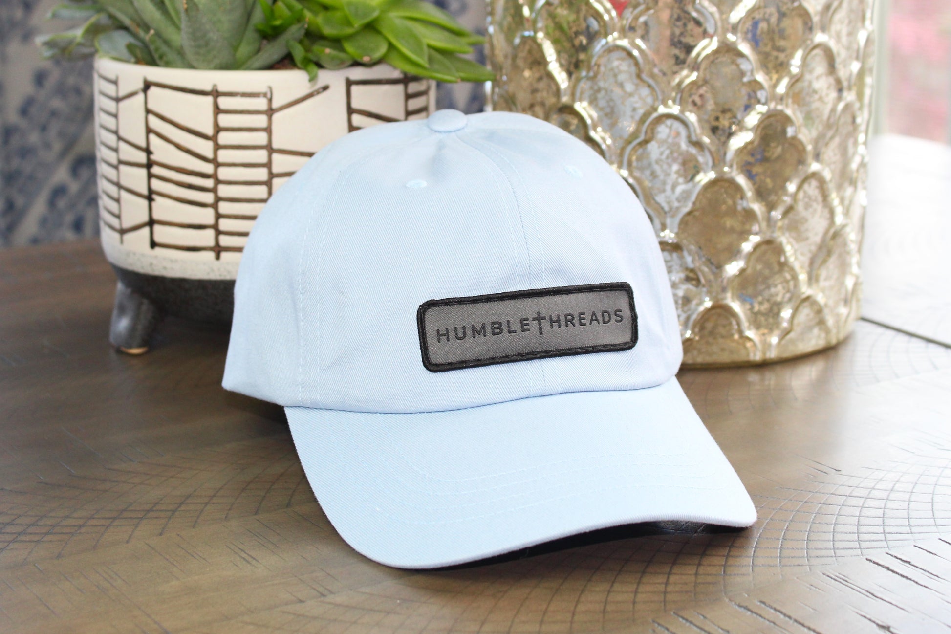 Light blue adjustable hat with a humble threads patch