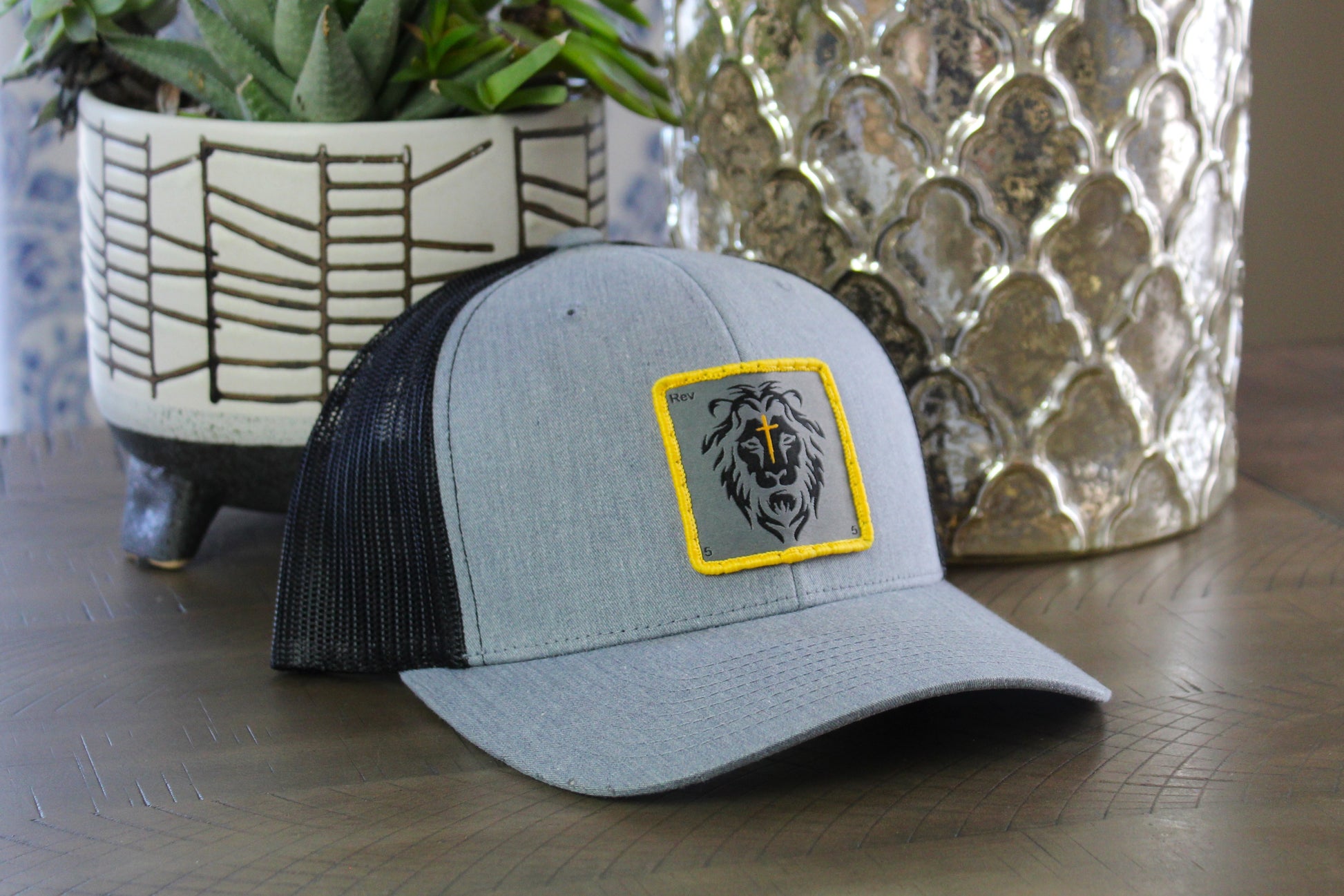Heather Gray/Black Snapback with a lion patch