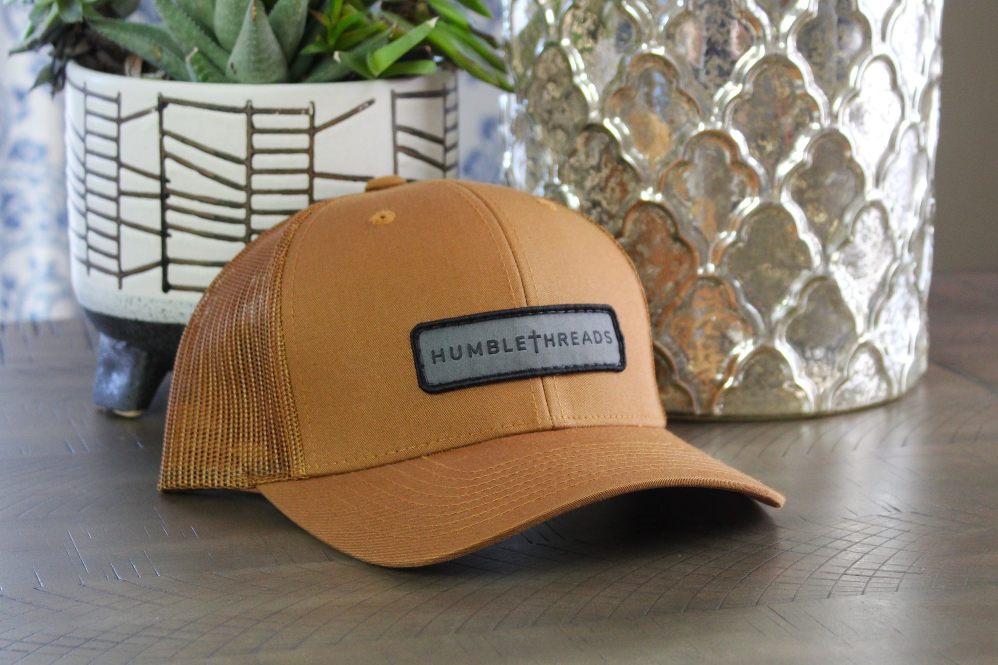 Caramel snapback with a humble threads patch