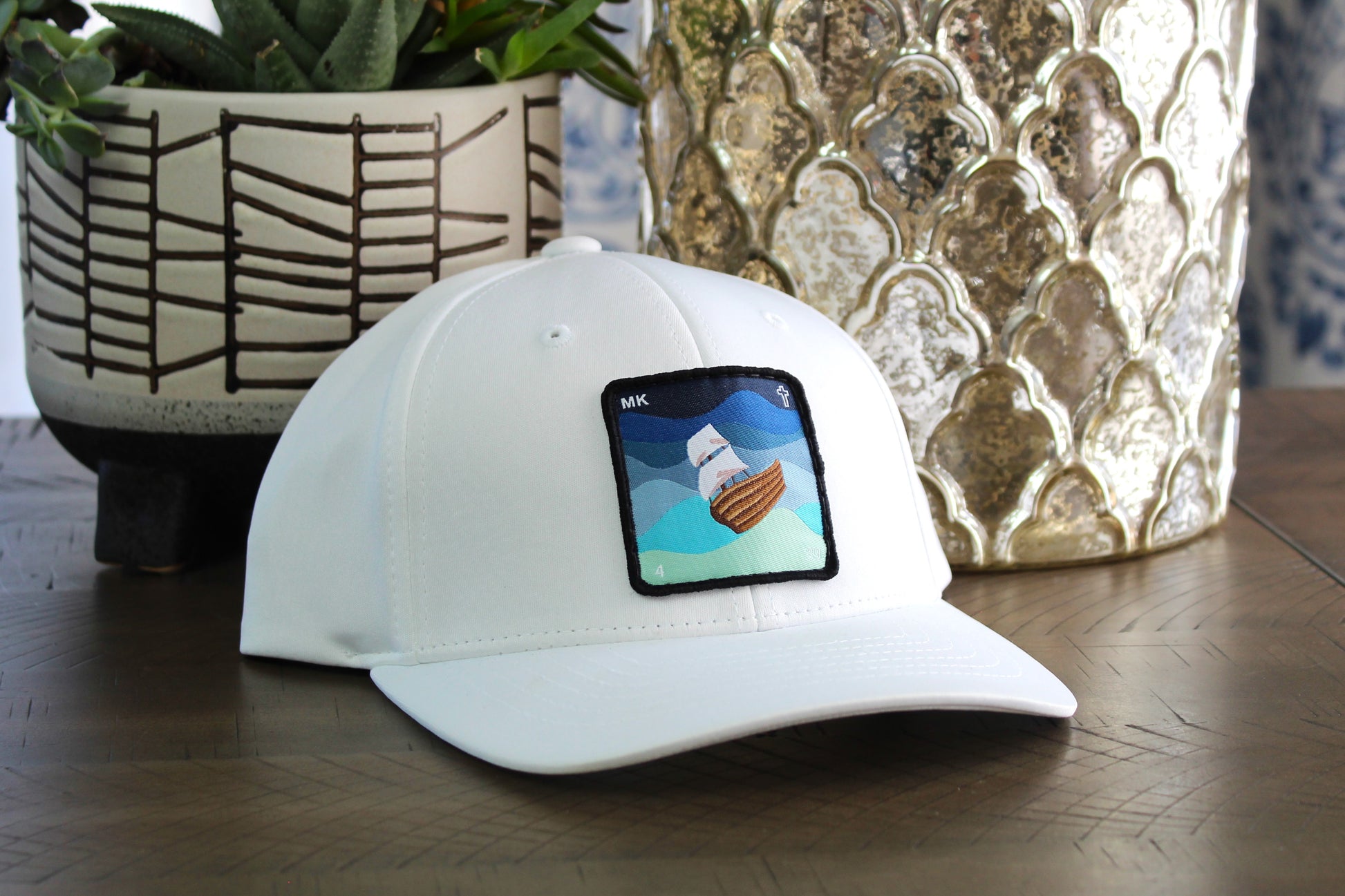 Youth White Snapback hat with a Jesus calms the storm patch