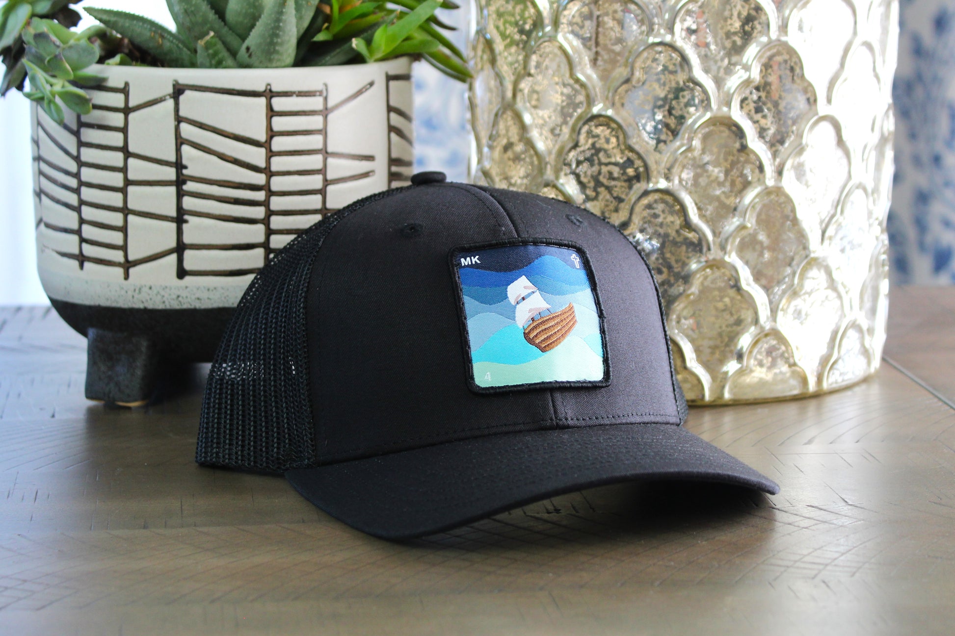 Youth Black Snapback hat with a Jesus calms the storm patch