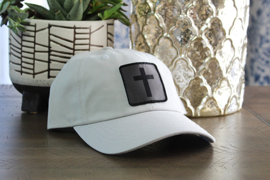 Light gray adjustable hat with a humble threads cross patch