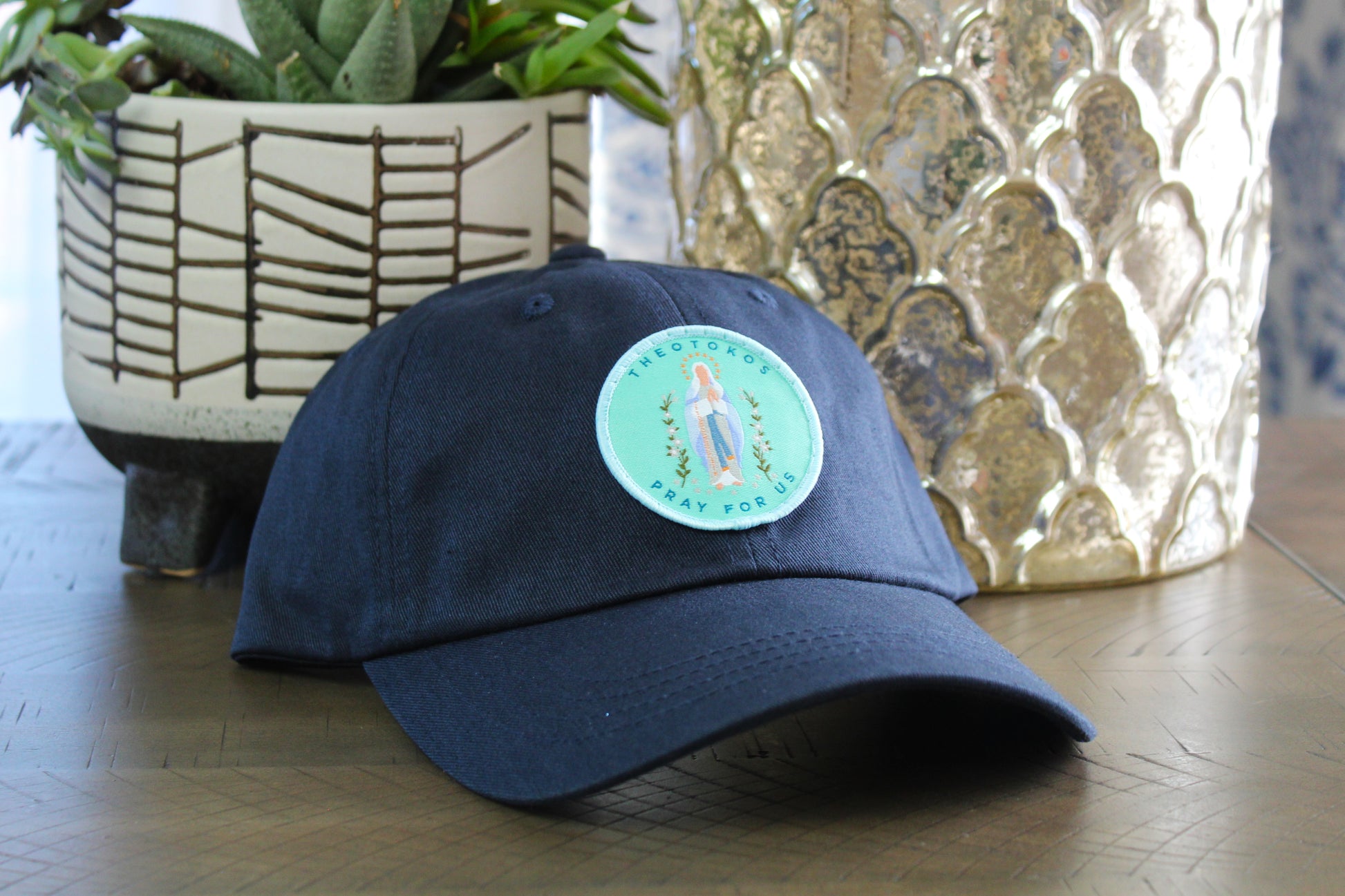 Navy adjustable hat with a theotokos patch