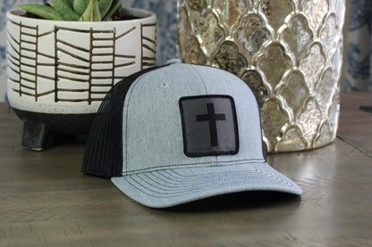 Heather gray/black youth snapback with a humble threads cross