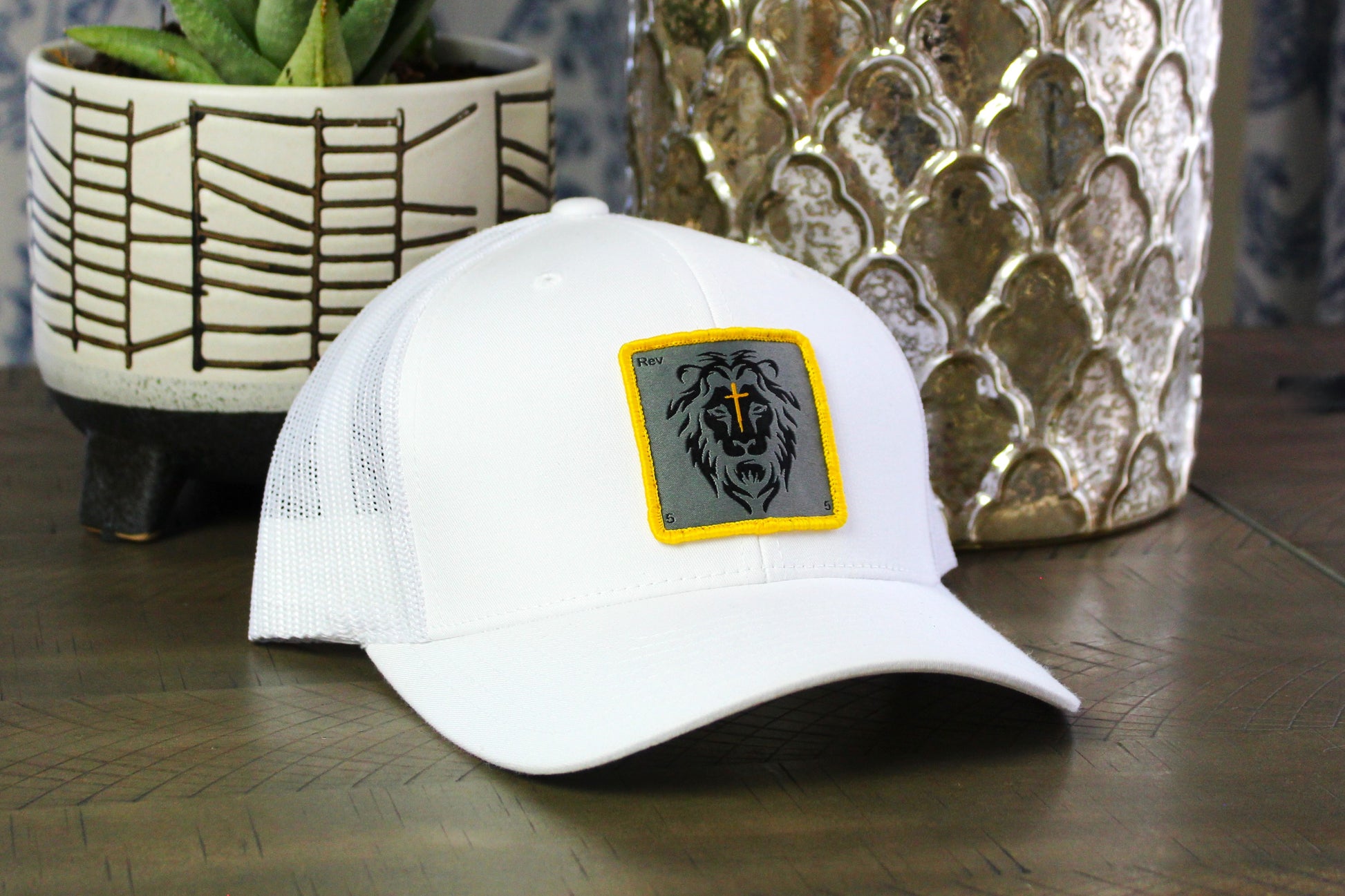 White Snapback with a lion patch