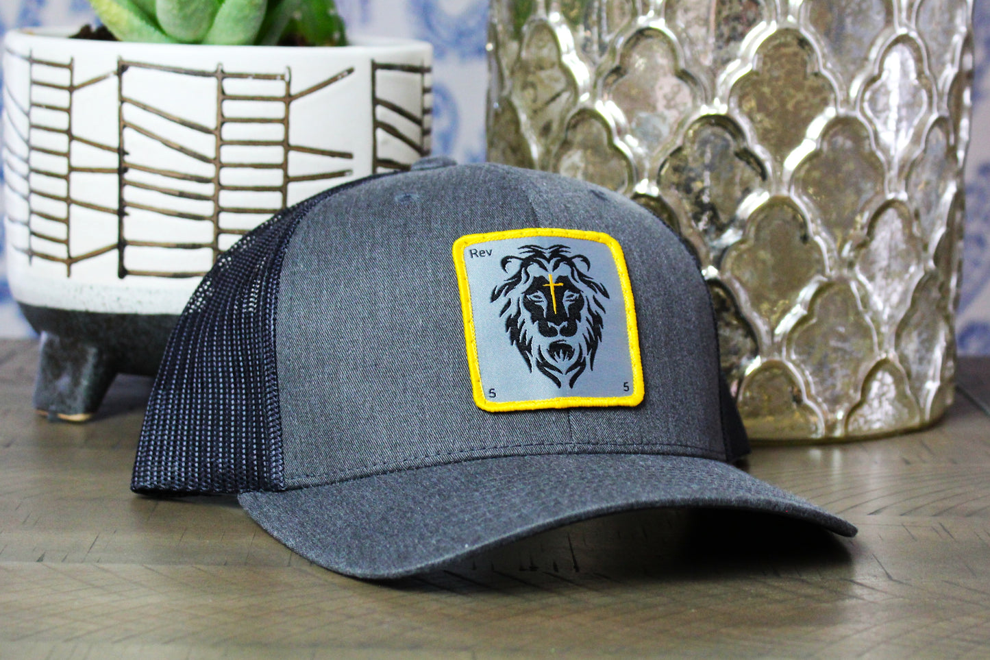 Dark Heather Gray/Black Snapback with a lion patch