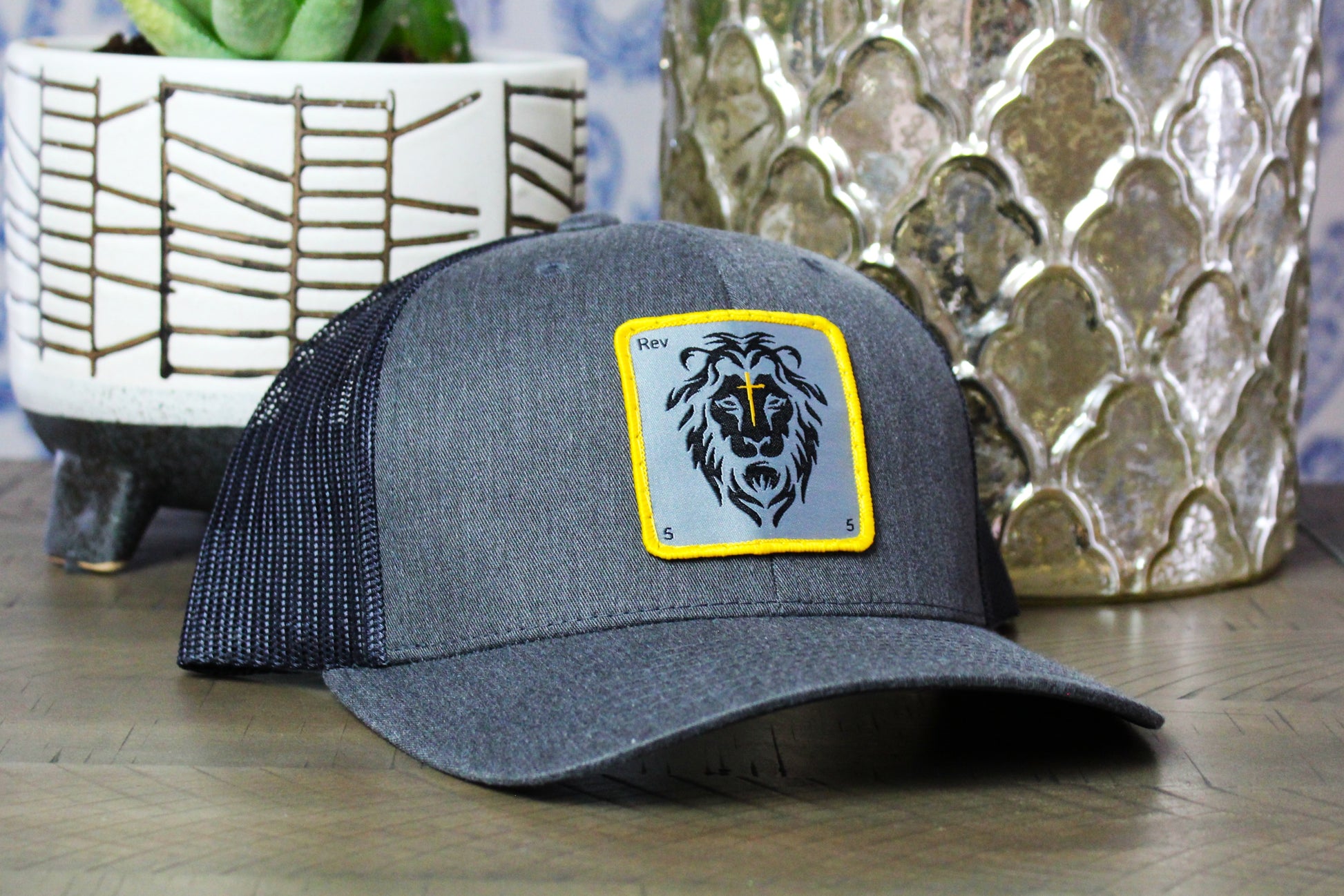 Dark Heather Gray/Black Snapback with a lion patch