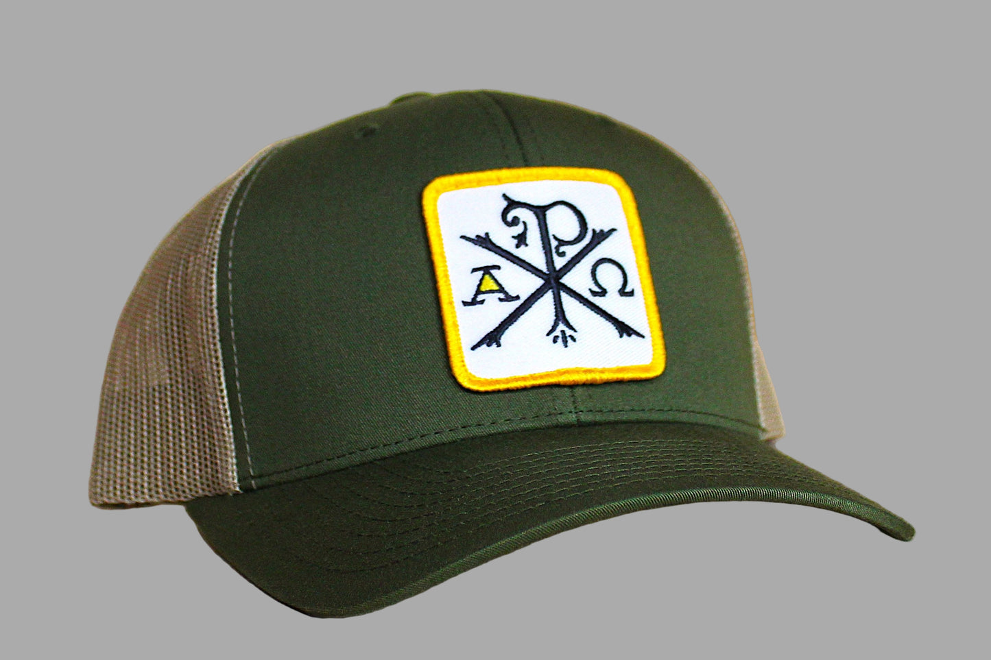 Green and brown cap with a logo patch on a gray background