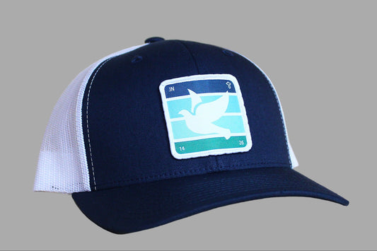 Navy blue and white cap with a logo on a gray background