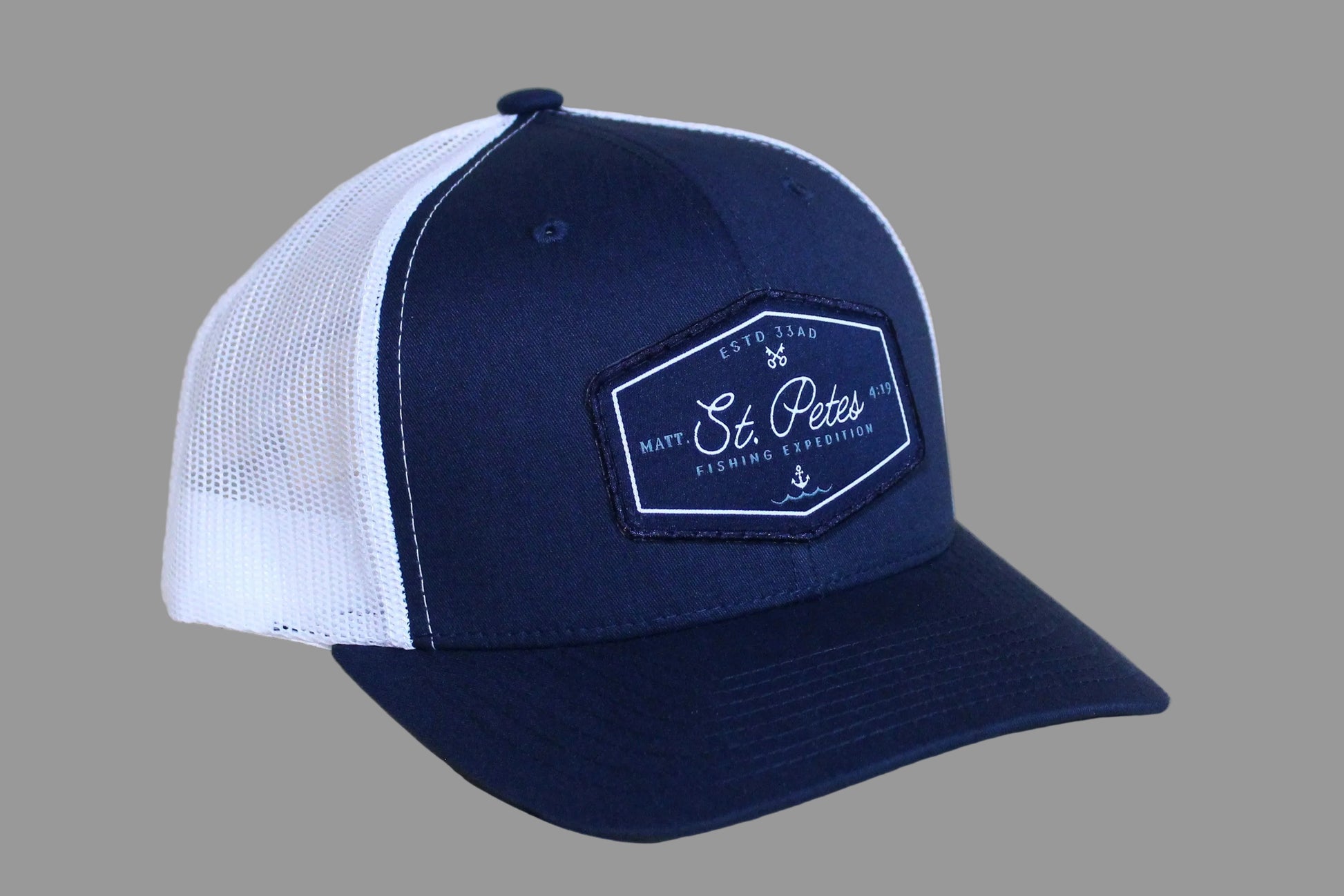 Navy and white cap with a logo 