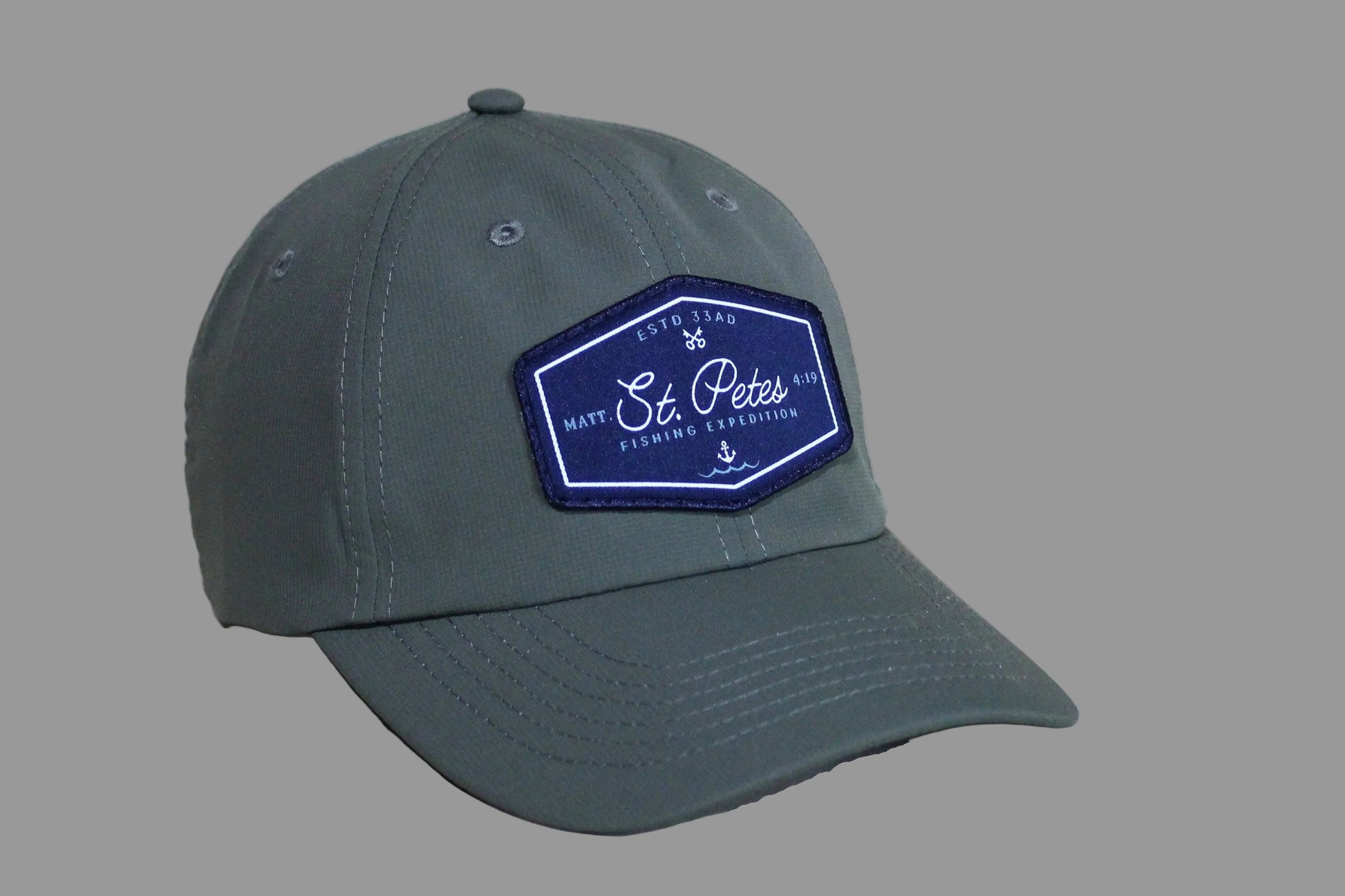 Green cap with a blue patch