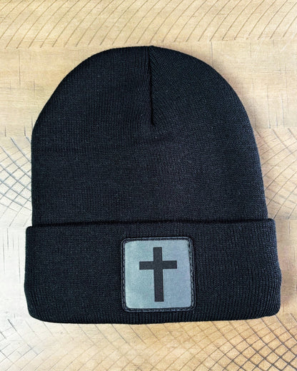 Black winter hat with humble threads cross patch
