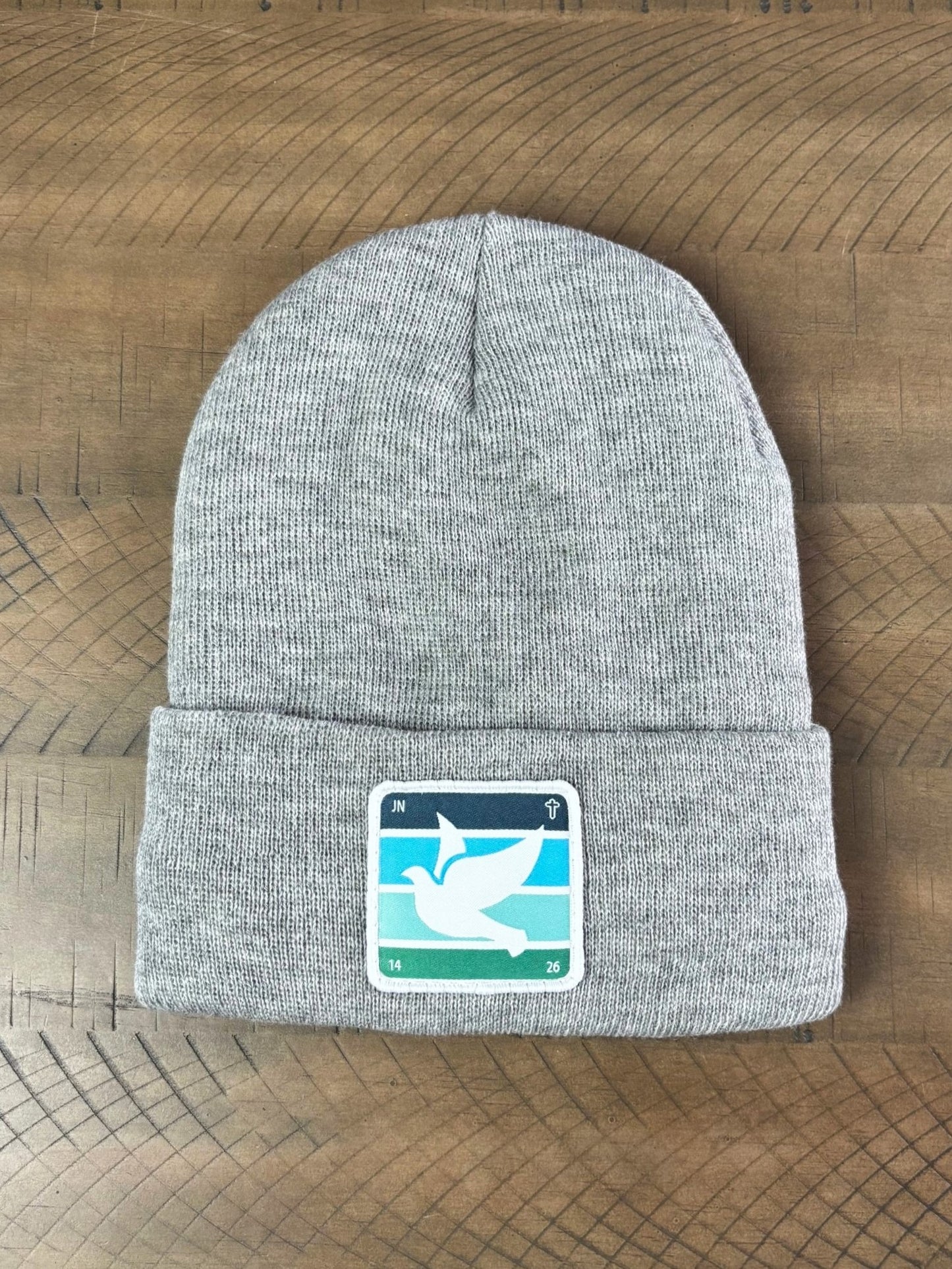 Heather gray winter hat with holy spirit dove patch