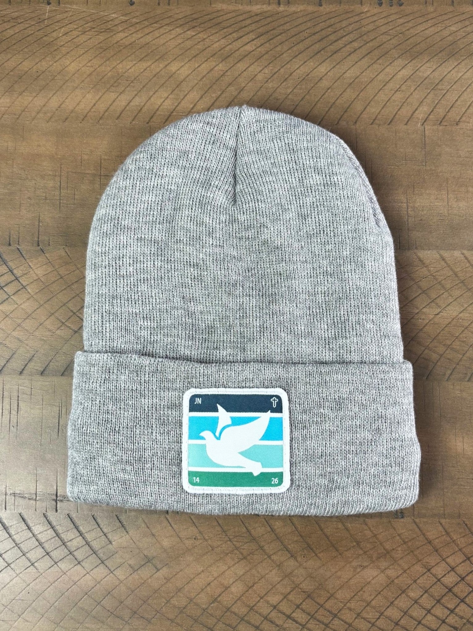 Heather gray winter hat with holy spirit dove patch