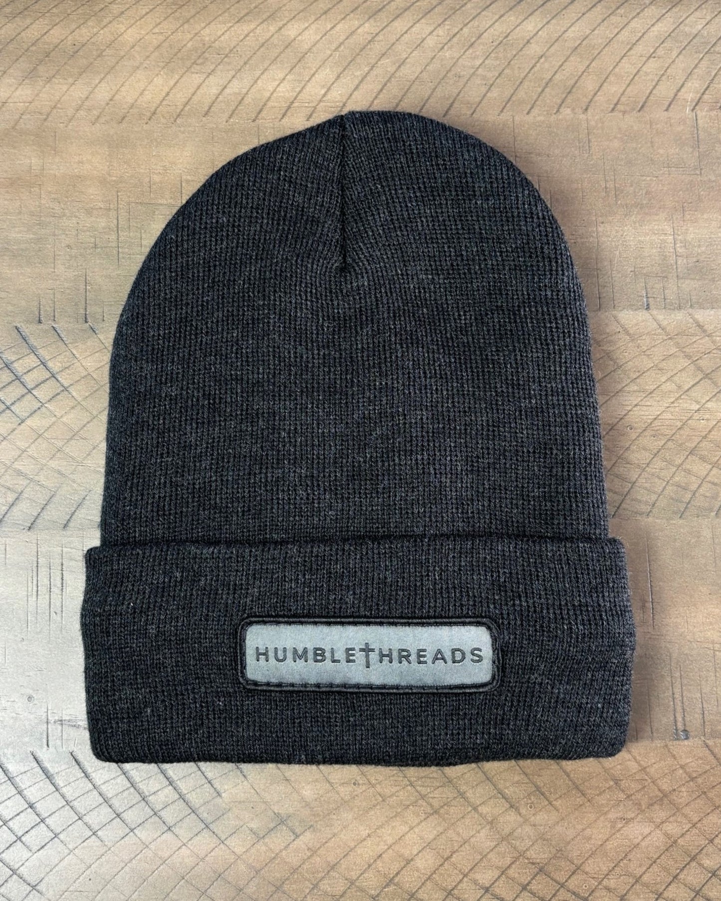 Heather charcoal winter hat with a humble threads patch