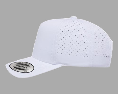 White baseball cap with perforated design on a white background